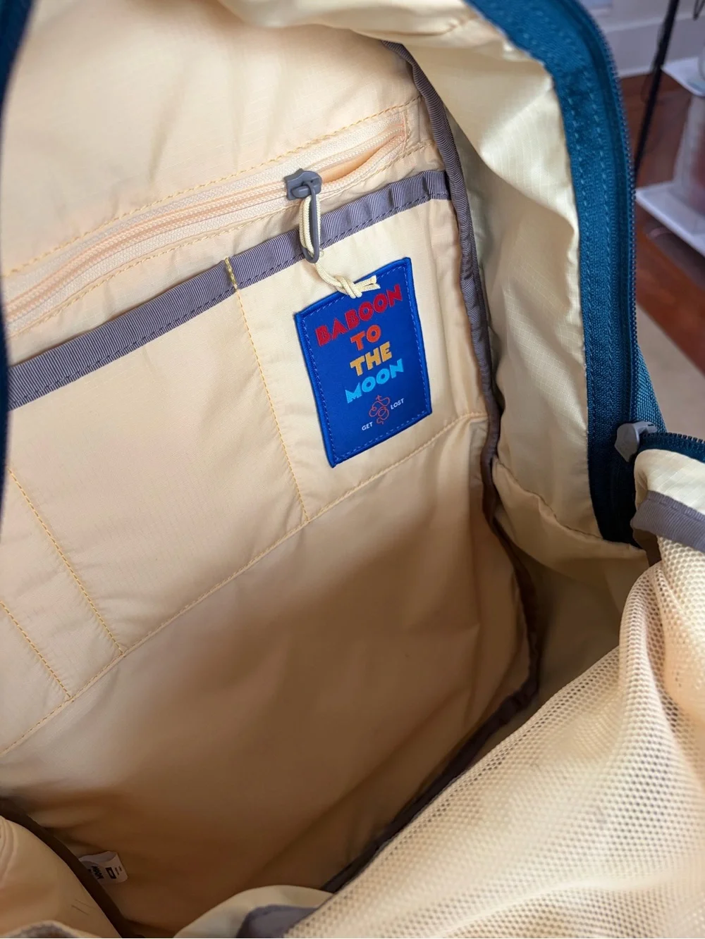 Baboon to the moon city backpack in teal with yellow